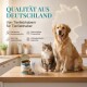 Tierfutterbehälter mit verspielten Katzen- und Hundedesigns. Der Text enthält humorvolle Phrasen und Größenoptionen: "KLEIN" (200/400g) und "GROSS" (800g).