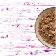 Schüssel mit zerkleinertem Nassfutter; lila Bereich 'Unser perfektes Versprechen' nennt Nährstoffe und keine künstlichen Zusatzstoffe.