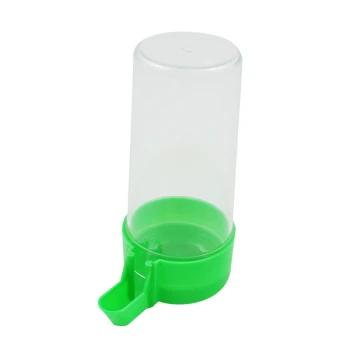 - Vogel Futterspender Klarer Futterspender für Haustiere mit grünem Boden und einer kleinen Futterplatte, entworfen für einfachen Zugang und Portionskontrolle.