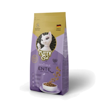 Kitty Cat Sensible Ente getreidefreies Katzenfutter mit Ente, hergestellt in Deutschland, mit einer weißen Katzenillustration auf lila und goldener Verpackung.