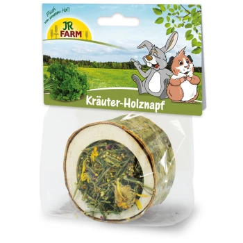 Holzschüssel gefüllt mit getrockneten Kräutern, verpackt mit einem bunten Etikett, das einen Hasen und ein Meerschweinchen zeigt, beschriftet mit "Kräuter-Holznapf."