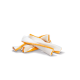 A pile of dog chew treats, featuring a white and orange design, on a white background.