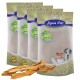 Drei Tüten Lyra Pet Nature Power Hundeleckerlis werden präsentiert, mit einer Vielzahl von Hunden auf der Verpackung und einigen Leckerli-Sticks davor.