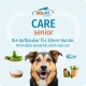 DOG FIT CARE Senior-Anzeige: Hund mit Kräutern, Pulver, Ölen und Eis; sichtbarer Text „Die Aufbaukur für ältere Hunde.“