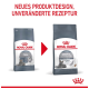 Das Bild zeigt zwei Tüten Royal Canin Katzenfutter, beschriftet mit "CARE ORAL" und "CARE DENTAL", mit einem roten Pfeil, der auf eine Produktdesignänderung hinweist.
