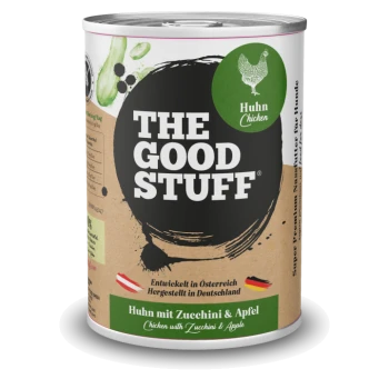 Dose mit "The Good Stuff" Hühnerfutter für Haustiere mit Zucchini und Apfel, beschriftet auf Deutsch und Englisch, mit österreichischen und deutschen Flaggen.