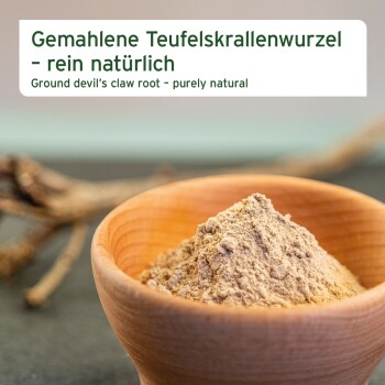 Gemahlene Teufelskrallewurzel in einer Holzschüssel, beschriftet mit "Gemahlene Teufelskrallewurzel - rein natürlich" und "Ground devil's claw root - purely natural."