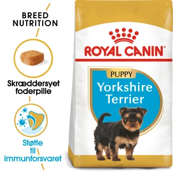 Royal Canin Welpenfutter für Yorkshire Terrier in einer Tüte mit einem kleinen Yorkshire Terrier Welpen, mit Text, der die Ernährungsbedürfnisse der Rasse und die Unterstützung des Immunsystems hervorhebt.