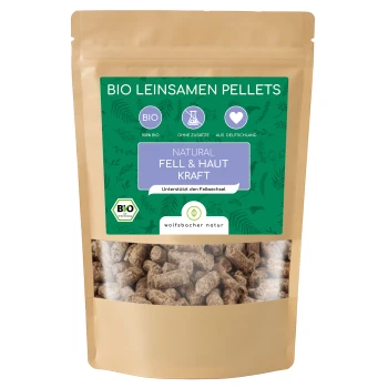 Bio-Leinsamenpellets in einem wiederverschließbaren Beutel, beschriftet mit "Natürliche Fell & Haut Kraft", die gesunde Haut und Fell für Haustiere fördern.