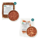 Rohe Haustierfutterprodukte, einschließlich einer 250g-Packung Rinderherz und einer 250g-Packung Thunfischfilet, mit einer Schüssel jeder Art ausgestellt.