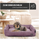 Ein gemütliches lila Hundebett mit einem Dackel, der darauf ruht, mit dem Text "ZUM EINKUSCHELN" und "schafft ein gemütliches Ambiente."