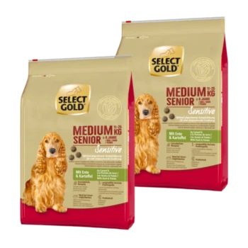 Zwei Säcke Select Gold Medium Senior Hundefutter für Hunde ab 8 Jahren, 11-25 kg, mit Ente und Kartoffel, mit einem goldenen Cocker Spaniel.
