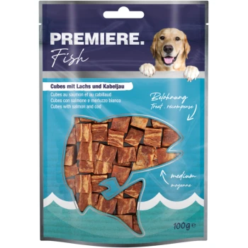 Emballage de friandises pour chiens présentant des cubes de saumon et de morue, étiqueté "PREMIERE Fish," avec une image de golden retriever et un texte indiquant qu'il s'agit d'une récompense moyenne.