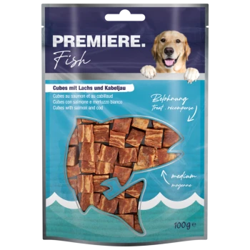 Emballage de friandises pour chiens présentant des cubes de saumon et de morue, étiqueté "PREMIERE Fish," avec une image de golden retriever et un texte indiquant qu'il s'agit d'une récompense moyenne.