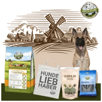 Ein Deutscher Schäferhund sitzt neben Haustierprodukten: Bellfor Hundefutter, einer 'HUNDE LIEB HABER' Tasche, Shiimun Hautergänzung und Dentalsticks.
