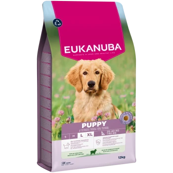 Roze en groene Eukanuba Puppy-hondenvoertas met foto van een gouden puppy, met tekst EUKANUBA, PUPPY en 12 kg.