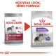 Comparaison d'emballage de nourriture pour chiens Royal Canin montrant la formule "Stérilisé Moyen" avec un nouveau look, comportant une image de chien et le texte "-10 % de calories."