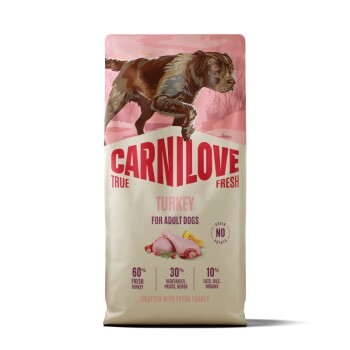 Sac de nourriture Carnilove avec illustration d'un chien courant, 'Dinde pour chiens adultes' — 60 % de dinde fraîche, 30 % de légumes/fruits/herbes.