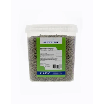 Conteneur de nourriture pour cobayes étiqueté "schweizer" avec un design vert et blanc, présentant les ingrédients et les informations nutritionnelles en allemand et en français.