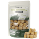 Brauner wiederverschließbarer Beutel Reavet Vital Soft Happen Z-Blocker Hundesnacks mit sichtbaren würfelförmigen Leckerlis innen.
