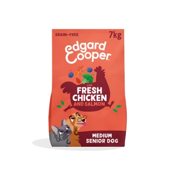 Orange Edgard Cooper 7kg dog food bag, grain-free, with FRESH CHICKEN AND SALMON, chicken silhouette and two cartoon dogs, "Medium Senior Dog"