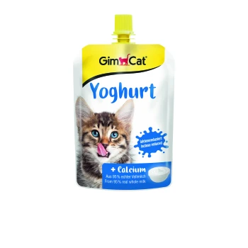 GimCat yoghurt pouch for cats featuring a playful kitten licking its lips, with text indicating lactose reduced and calcium added.