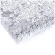 Weiche graue Haustierdecke mit flauschiger Textur, ideal, um Haustiere warm und bequem zu halten.