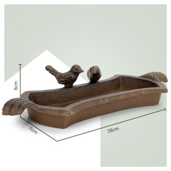 Ein dekoratives braunes Futternapf aus Gusseisen mit einem Vogel- und Balldesign, das 28 cm x 11 cm x 6 cm misst.