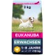 Hundefutterbeutel mit einem laufenden Hund auf einer grünen Wiese, beschriftet mit "EUKANUBA," 3 kg, für erwachsene Hunde im Alter von 1-8 Jahren, unter 10 kg.