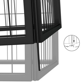 Nahaufnahme einer Ecke einer Haustierbox mit schwarzen und grauen Metallstäben, mit einem Symbol, das einen Verriegelungsmechanismus anzeigt.