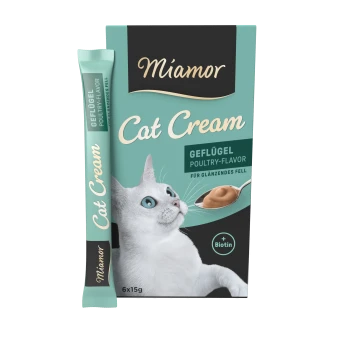 Miamor Cat Cream im Geflügelgeschmack, mit einer weißen Katze auf der Verpackung, mit einem Löffel Sahne und " + Biotin" hervorgehoben.
