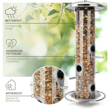 Ein wetterfester Vogelhaus aus hochwertigem Metall, gefüllt mit Samen, mit hygienischer Fütterung und für Getreidefutter konzipiert.