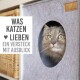 Ein graues Filz-Katzenversteck mit einer runden Öffnung, mit dem Text "Was Katzen ♥ Lieben Ein Versteck Mit Ausblick."