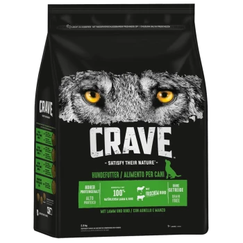 Czarna torba z karmą dla psów z twarzą wilka i żółtymi oczami, oznaczona "CRAVE - Satisfy Their Nature," wysokobiałkowa, bez zbóż, świeża jagnięcina i wołowina.