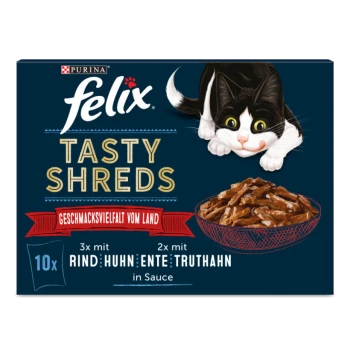Verpackung für Purina Felix Tasty Shreds Katzenfutter, mit einer verspielten schwarz-weißen Katze, mit einer Schüssel mit zerrissenem Fleisch in Sauce.