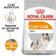 Royal Canin Coat Care Mini hondenvoer zak met een lachende Shetland Sheepdog, die gezonde, glanzende vachten in 28 dagen promoot.