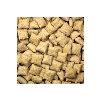 Close-up of small, square-shaped pet food kibble, light brown in color, scattered across a surface.