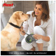 A woman in white holds a green and black Flexi dog leash while interacting with a golden retriever. Flexi logo and text included.