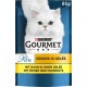Emballage de nourriture pour chats Purina Gourmet avec un chat blanc, étiqueté "Perle Genuss in Gelée" avec du poulet en gelée, 85g.