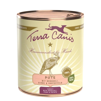 Dosen-Hundefutter von Terra Canis mit Truthahn, Brokkoli, Birne und Kartoffel. Das Etikett besagt "100% Natur" und "Hausmannskost für Hunde."
