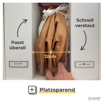 Eine Hand, die nach einem gefalteten Haustierartikel in einer Aufbewahrungsbox greift, mit Text, der anzeigt, dass es überall passt (12 cm) und schnell verstaut werden kann.