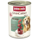 Dose Animonda GranCarno Adult 1+ Hundefutter mit Wild, zeigt rohe Fleischstücke und einen glücklichen Golden Retriever.