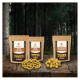 Drei Tüten Wildfang-Käse-Snacks für Hunde liegen auf einer Holzoberfläche, mit sichtbaren Etiketten "Harties", "Softies" und "Käsebrocken".