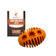 Orangenes rugbyförmiges Hundespielzeug aus Naturkautschuk, mit einer Verpackung, die "RUGBYSNACKER RAYA" von Wildfang beschriftet ist.