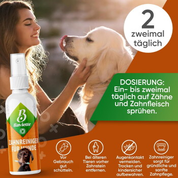 Frau mit einem Golden Retriever und einer Baviette-Sprayflasche mit der Aufschrift 'Zahnreiniger für Hunde' und der Dosierungsangabe '2 zweimal täglich'