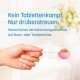 Hand hält einen pinken Messlöffel mit hühnaromatisiertem Pulver; deutscher Text: „Kein Tablettenkampf. Nur drüberstreuen.“