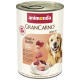 Boîte de nourriture pour chien Animonda GranCarno Adult 1+ au bœuf et poulet, avec un golden retriever heureux et un bol de nourriture.