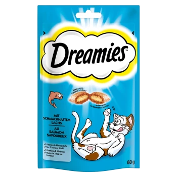 A blue package of Dreamies cat treats featuring a playful cat illustration, with text highlighting salmon flavor and nutritional benefits.