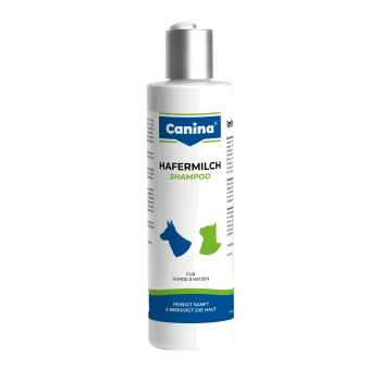 Weiße Flasche mit der Aufschrift Canina HAFERMILCH SHAMPOO für Hunde & Katzen, blaue und grüne Hunde- und Katzen-Icons, Text: Reinigt sanft & beruhigt die Haut