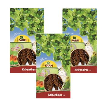 Trois paquets de nourriture pour oiseaux JR FARM Kolbenhirse rot, présentant un fond vert avec des feuilles et des images d'oiseaux sur l'emballage.